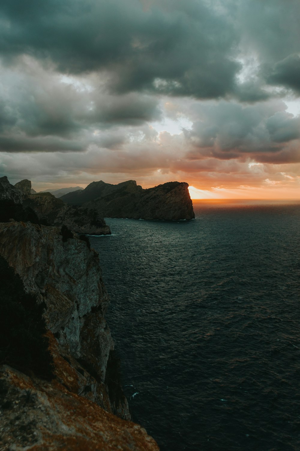 calm body of water in island during daytime