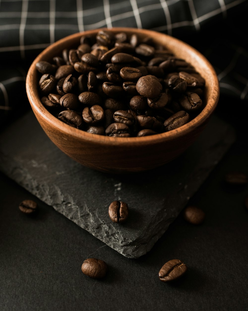 brown coffee seeds in bowl
