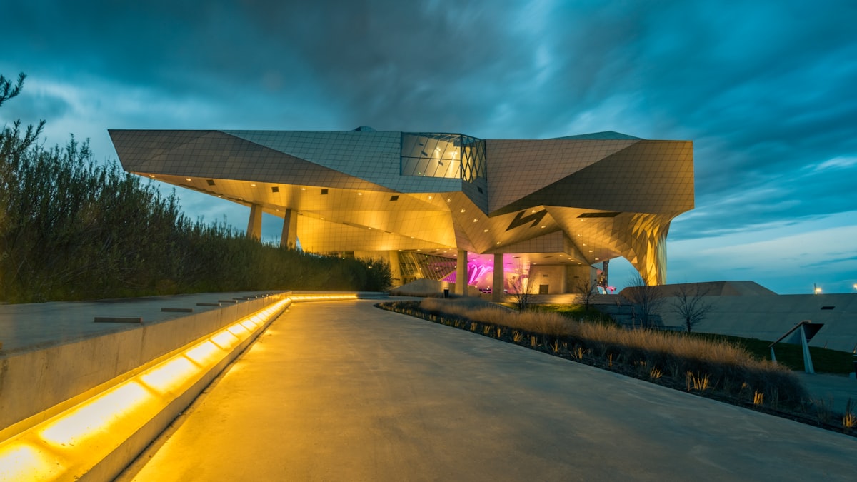 The Musée des Confluences in Lyon — a dramatic deconstructivist glass and steel building at blue hour