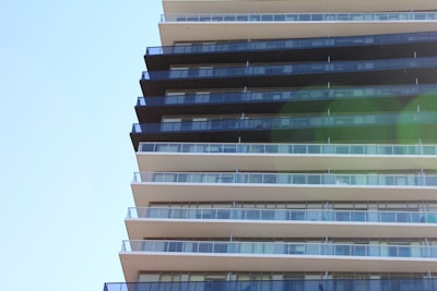 High-rise apartment building showcasing sleek, contemporary design.