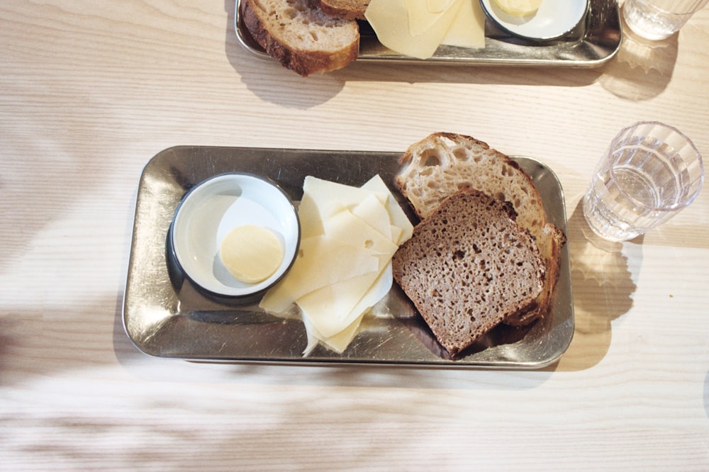 cheese and bread on tray