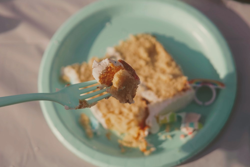 selective focus photography of fork with baked bread