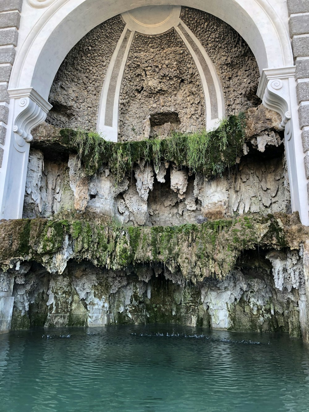 concrete building with stones during daytime