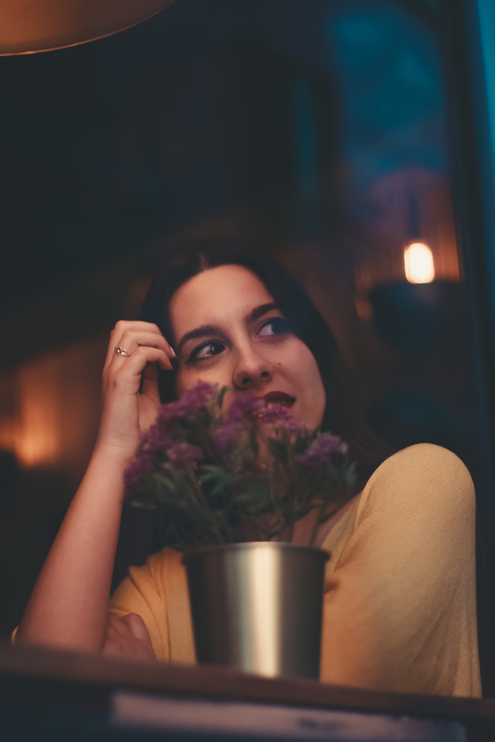 woman touching her head