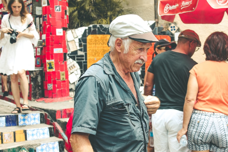 man wearing grey flat cap
