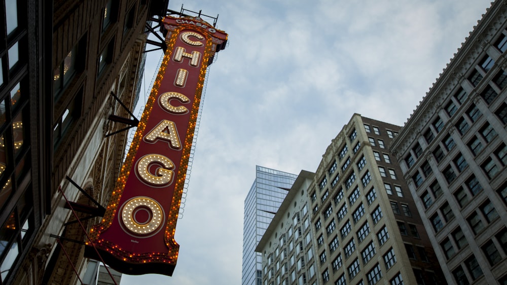 red and white Chicago signage during daytime