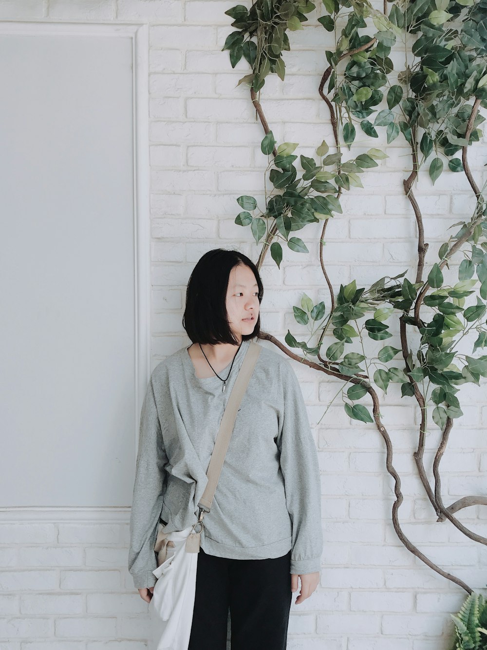 woman standing near tree