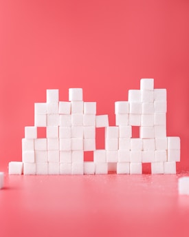 white sugar cube forming lines