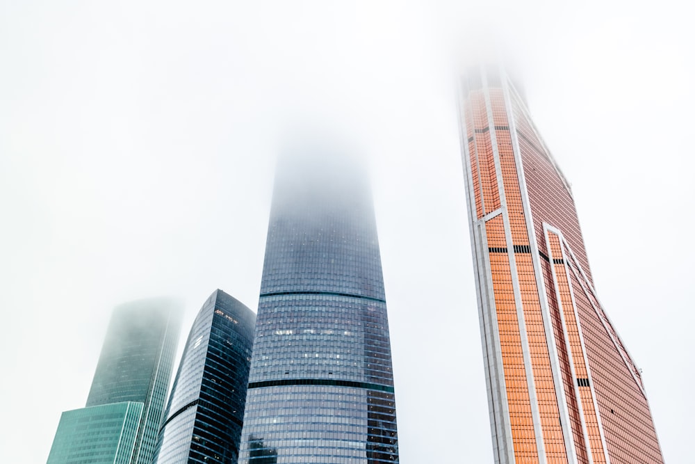 low-angle photography of high-rise buildings