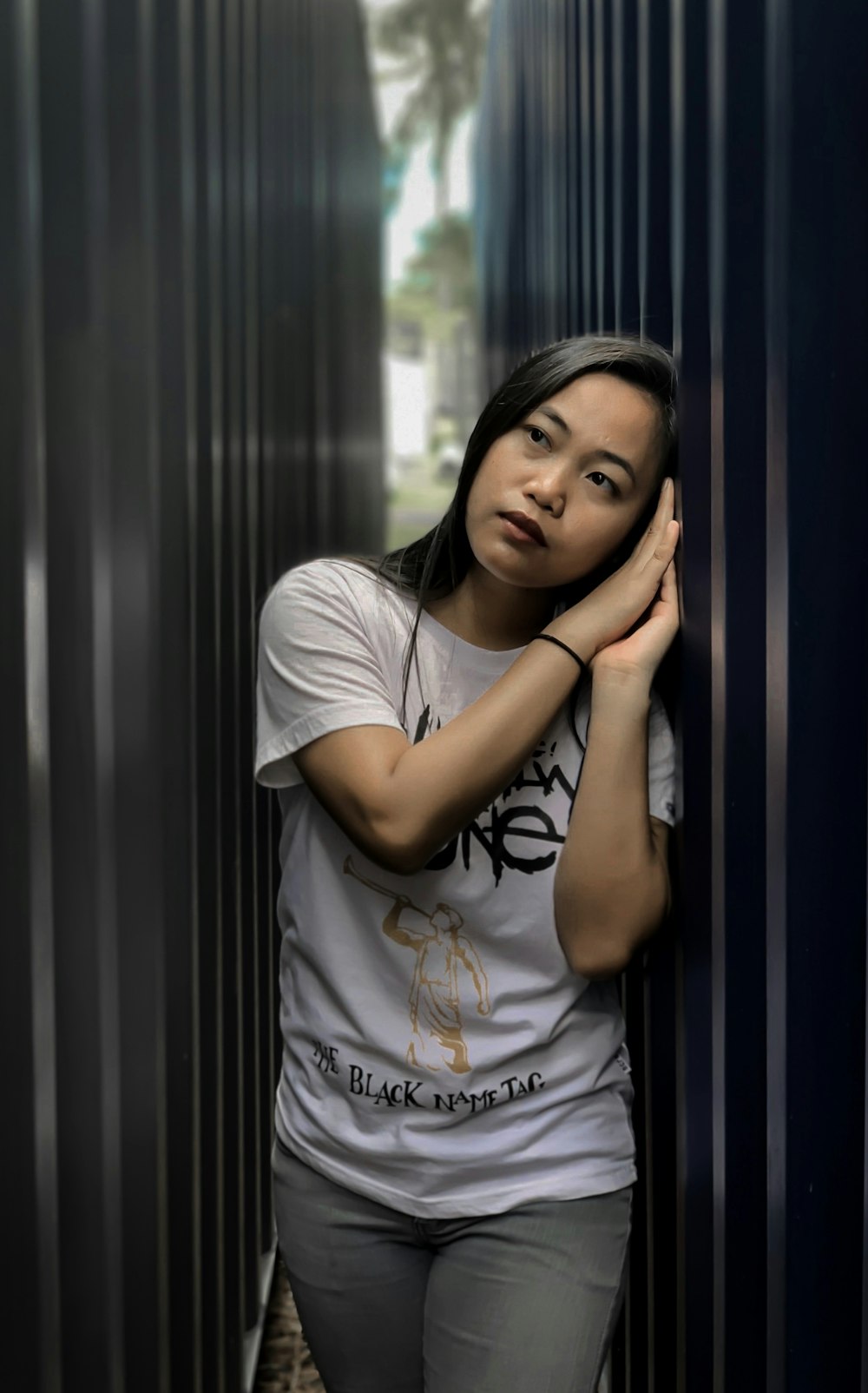 shallow focus photo of woman in white crew-neck T-shirt