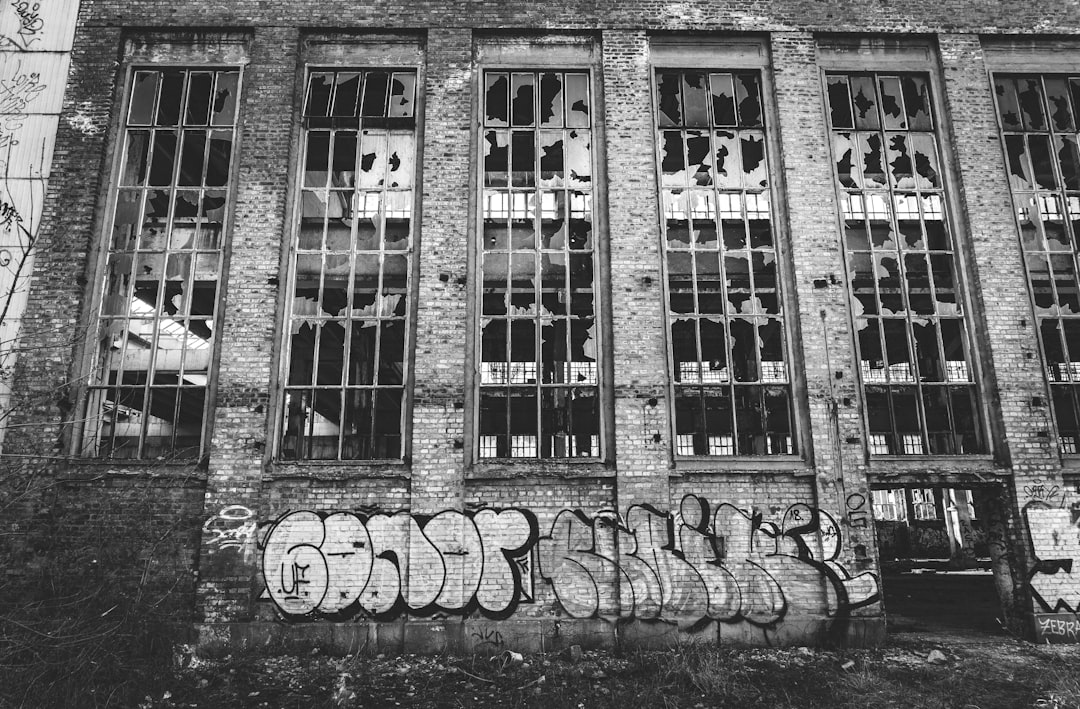 grayscale photo of abandoned building