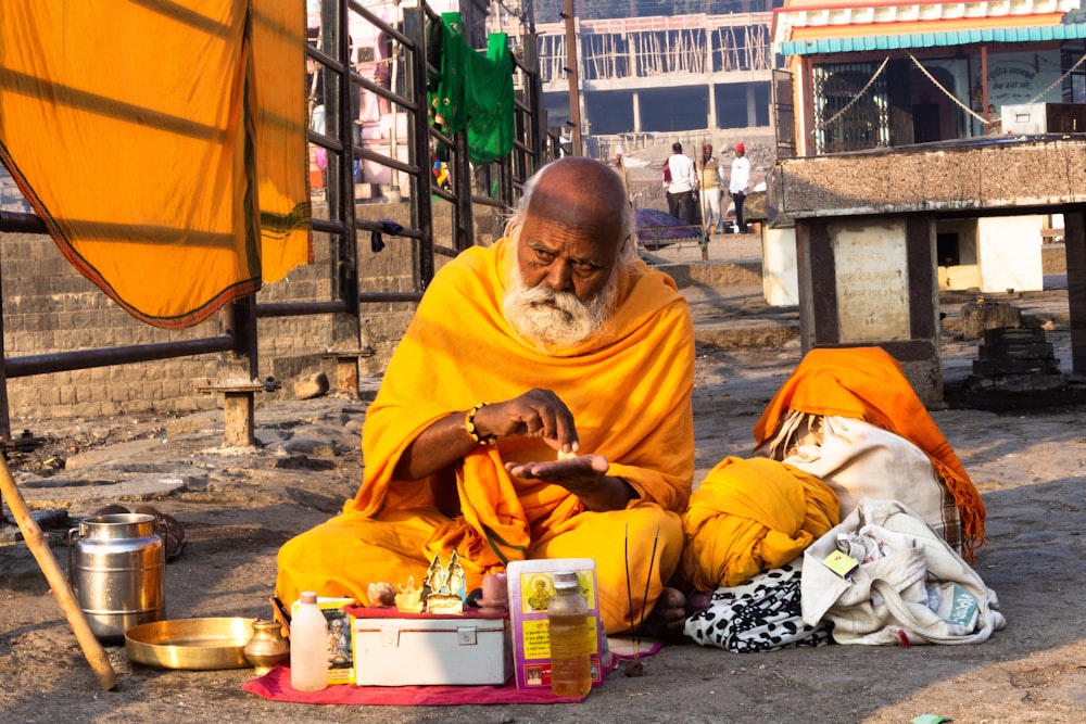 man sitting on ground