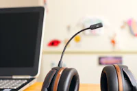 Customer support headset beside a laptop