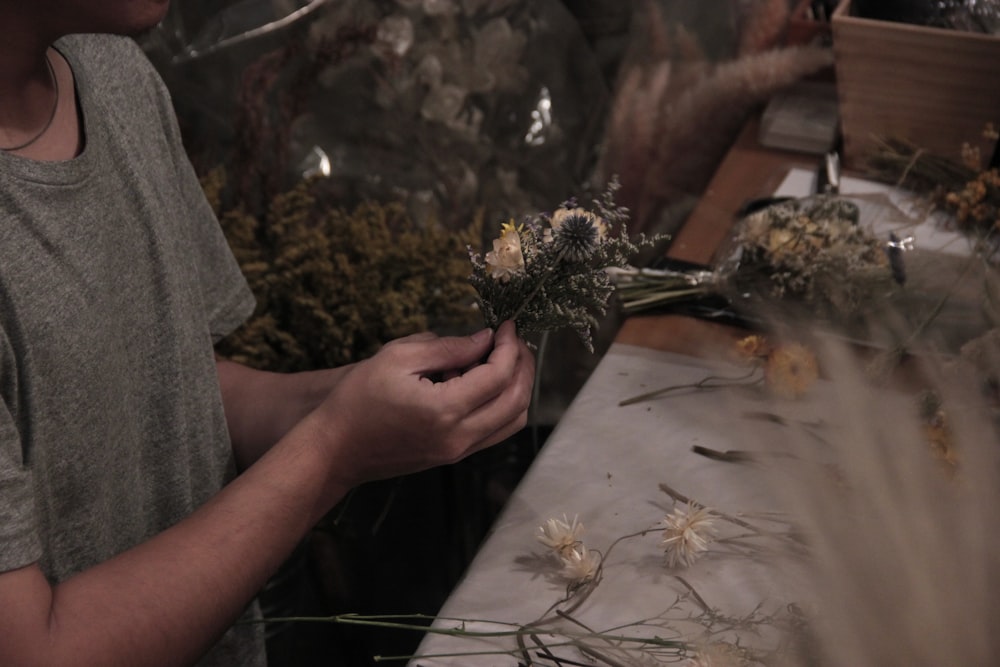 person holding flower