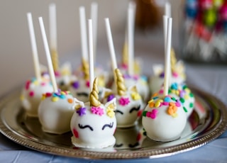 shallow focus photo of unicorn lollipops