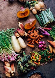 assorted vegetables on brown textile