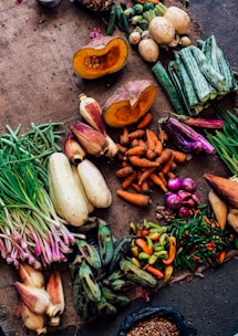 assorted vegetables on brown textile