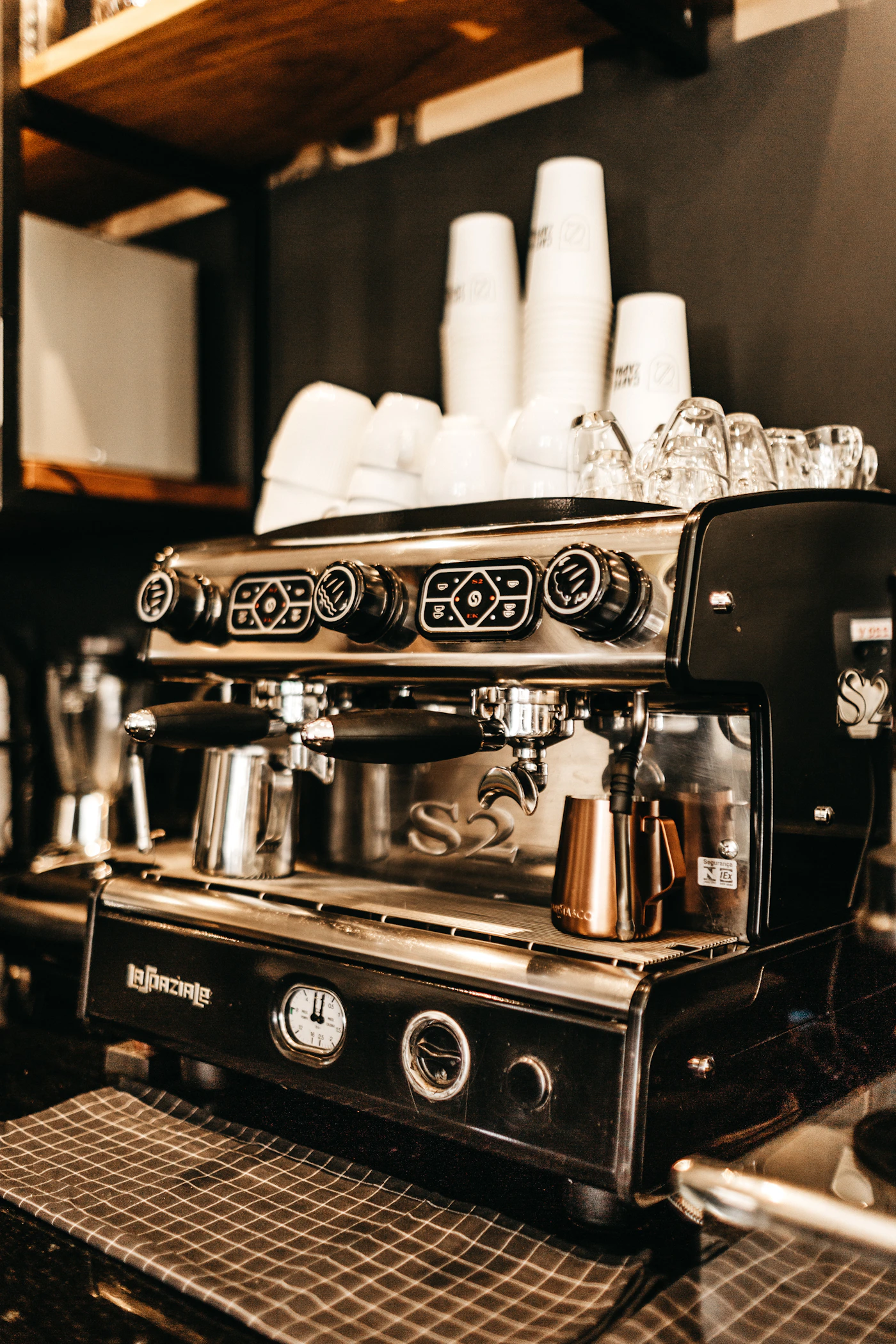 Beautiful espresso machine in a warm, modern space