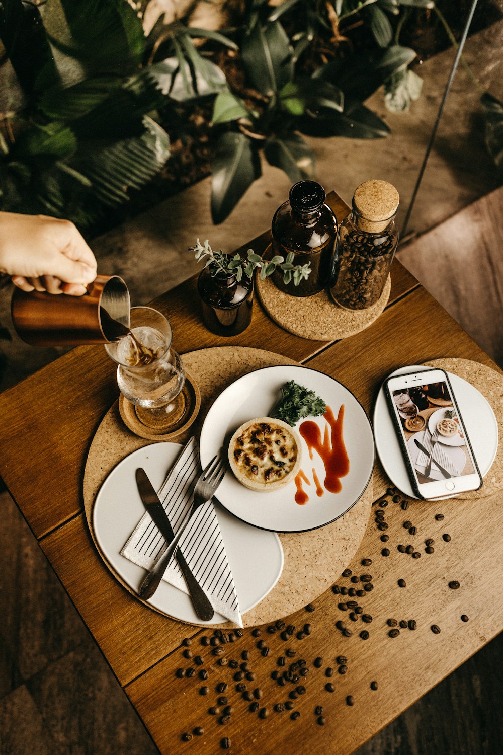 food photography of baked pastry beside stainless steel fork and dinner knife