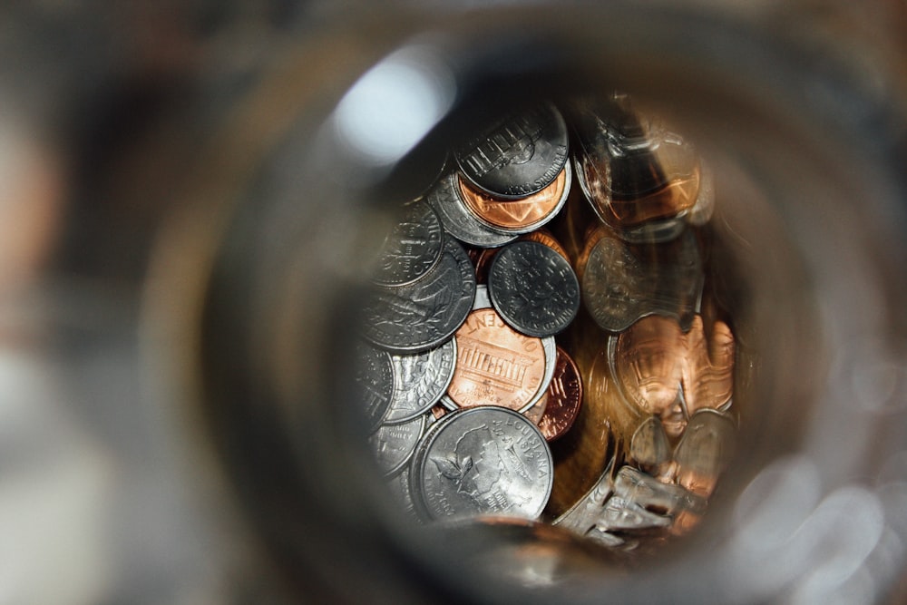 shallow focus photography of coin collection