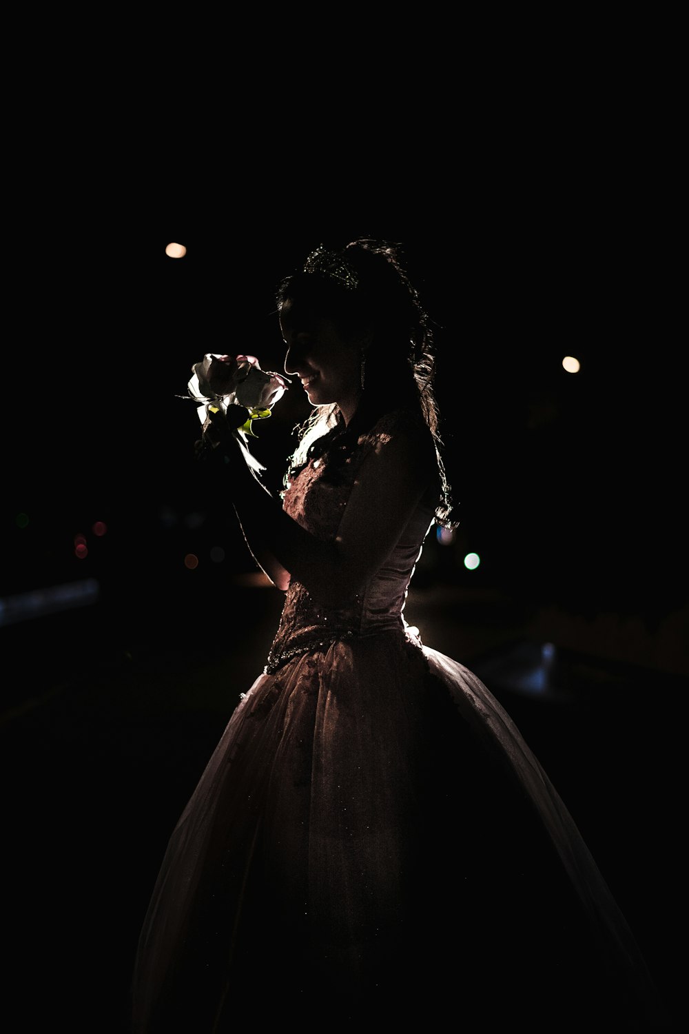 woman holding flower bouquet