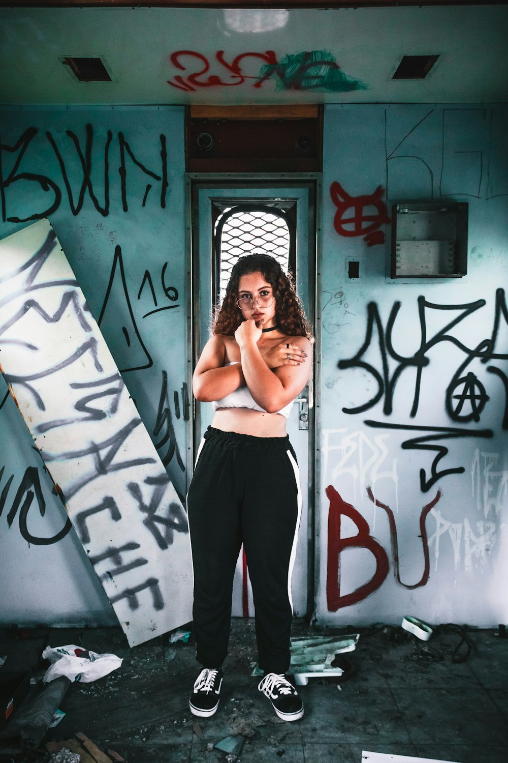 woman standing near door