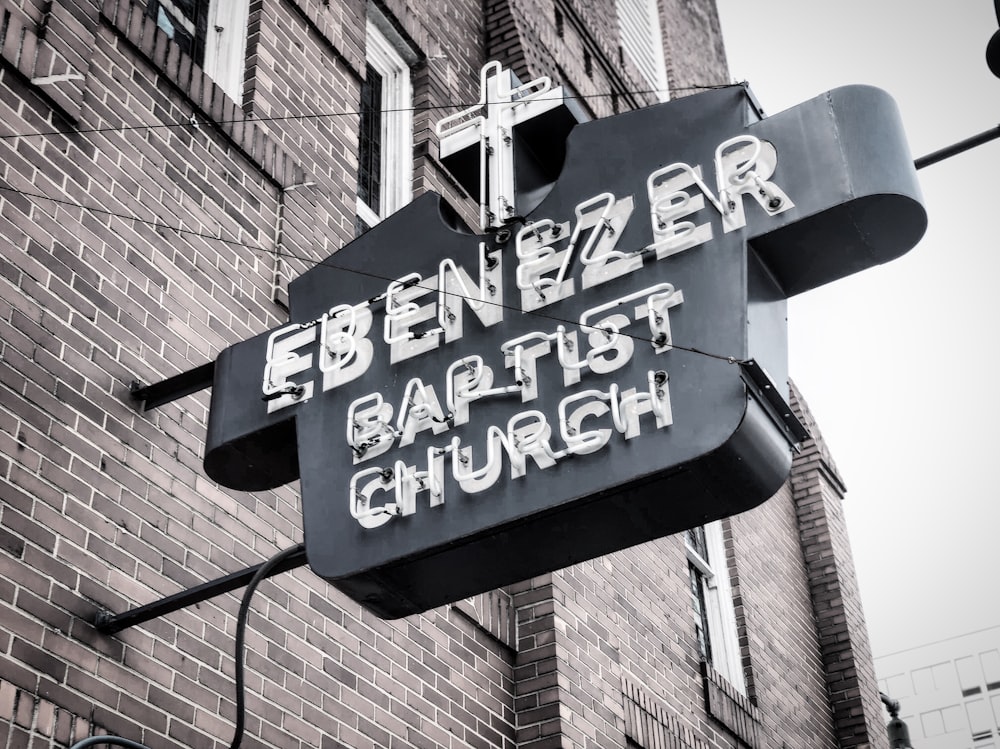 grayscale photo of Ebenezer Baptist Church signage