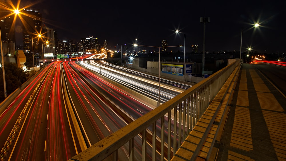 timelapse photography of vehicles at night