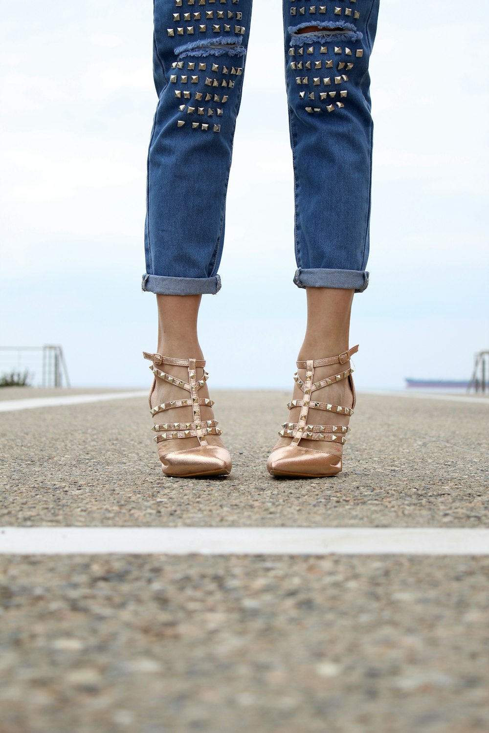 woman wearing beige leather heels