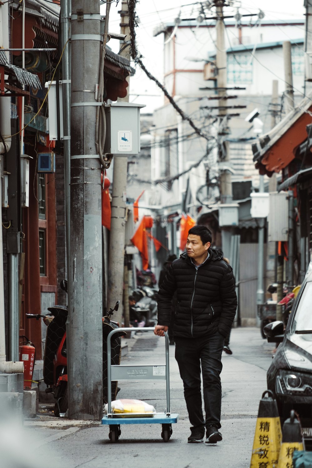 man walking with trolley