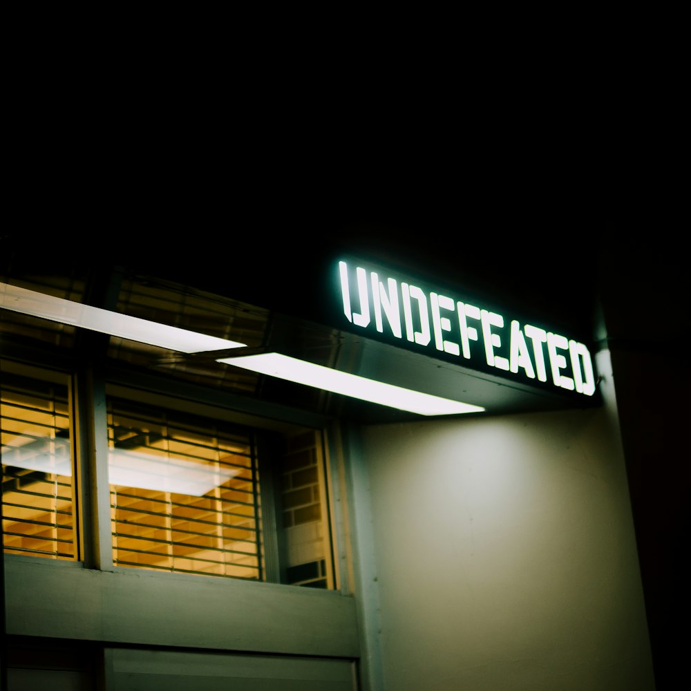 undefeated signage turned-on on building