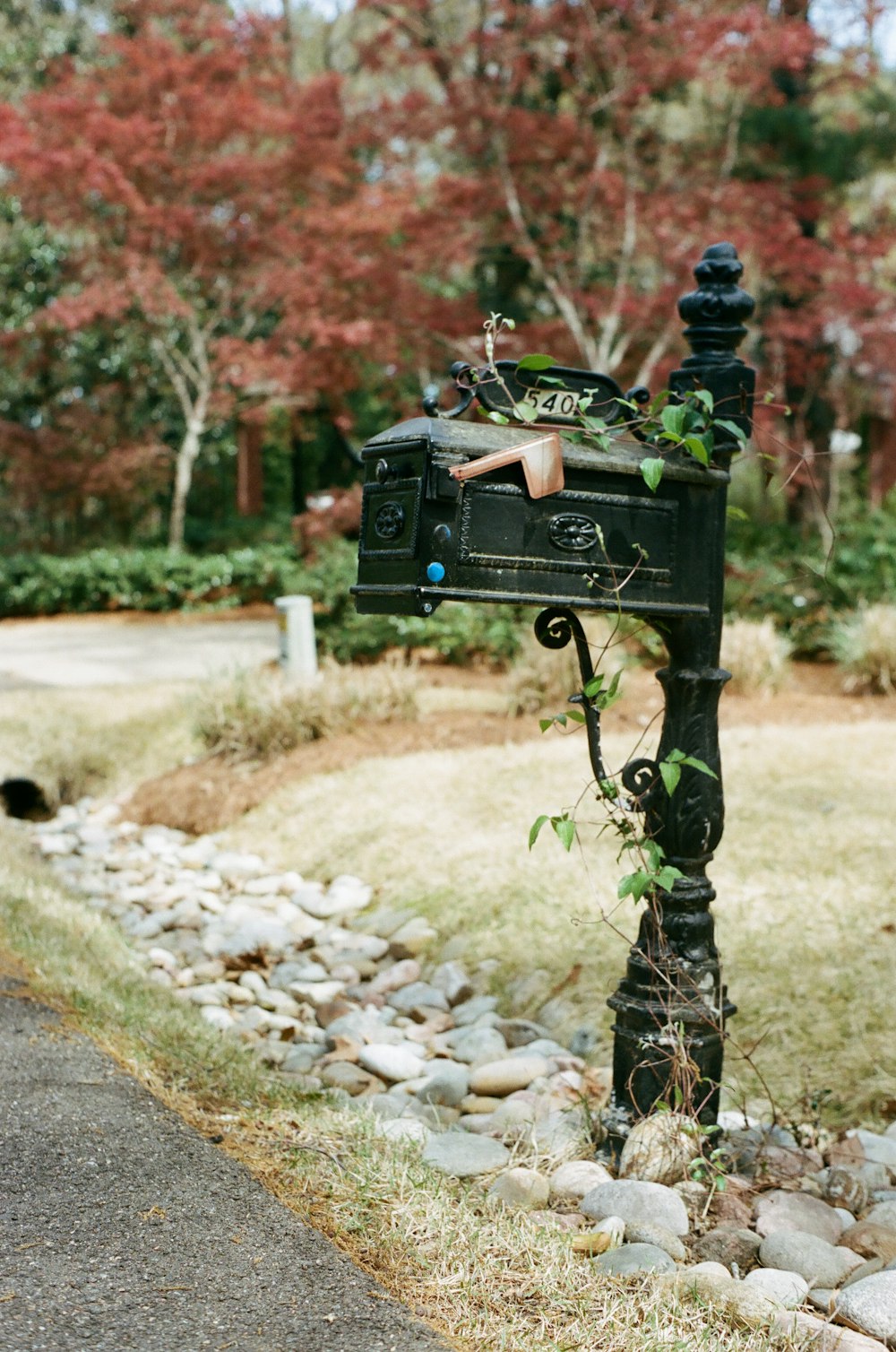 black mailbox with mail