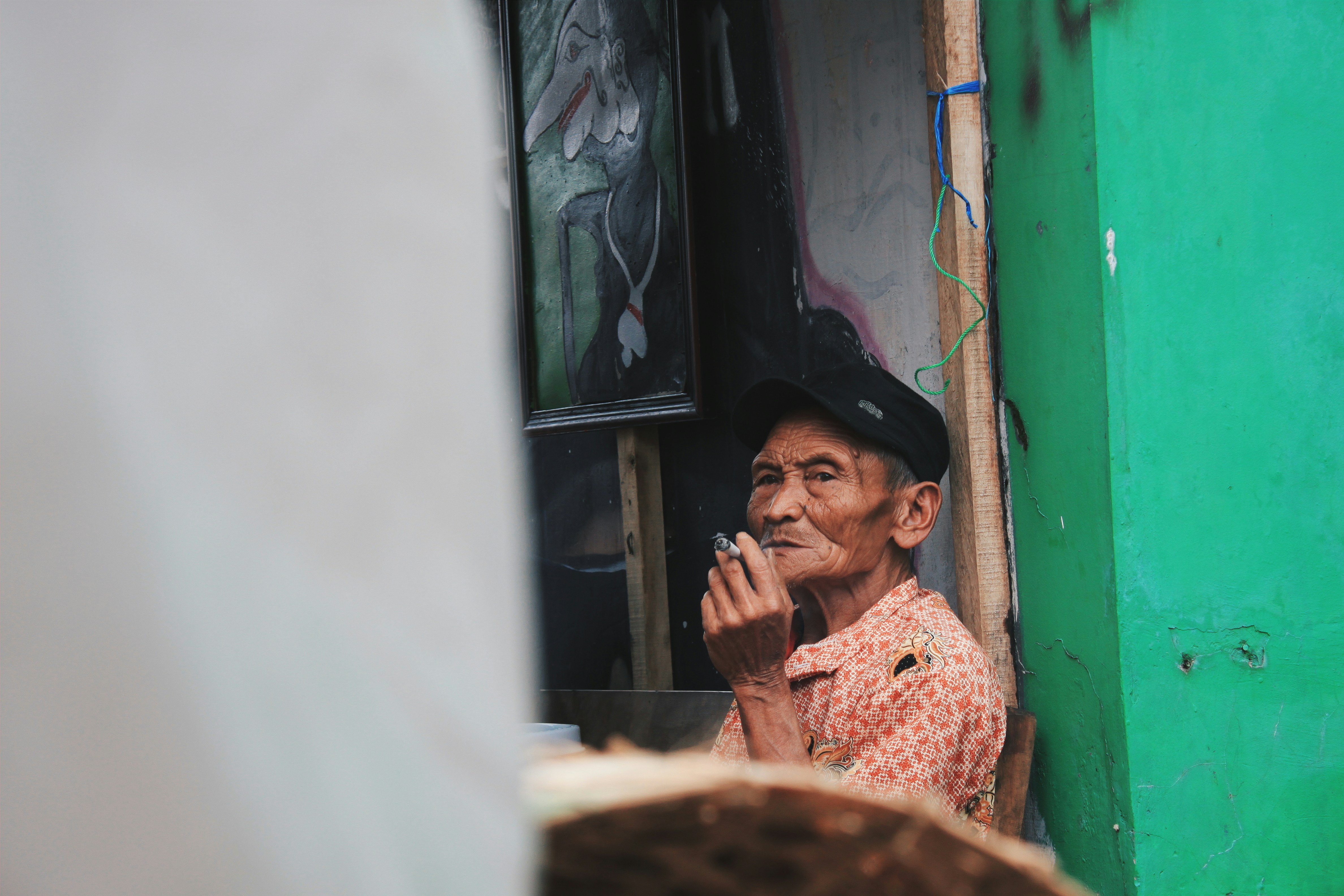 man smoking sitting