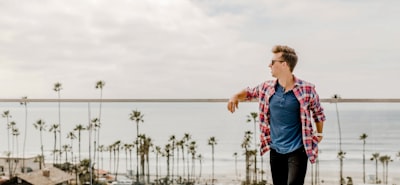 man in sunglasses looking right conversational teams background