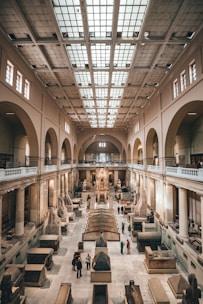 people inside white building during daytime