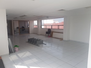 A spotless empty living room after a move-out cleaning session.
