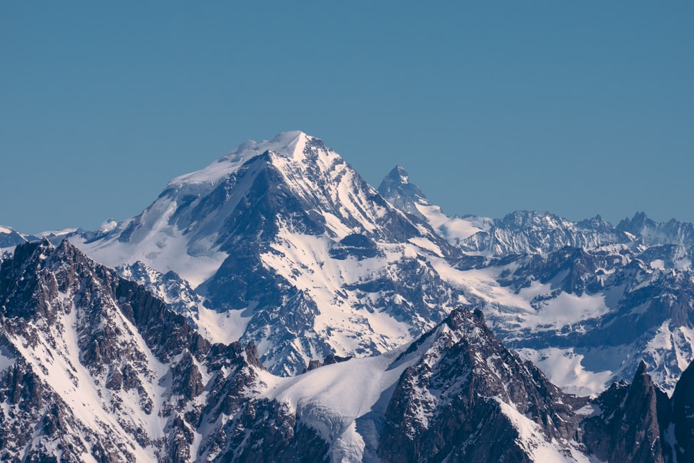 high-rise photography of snow-covered mountain