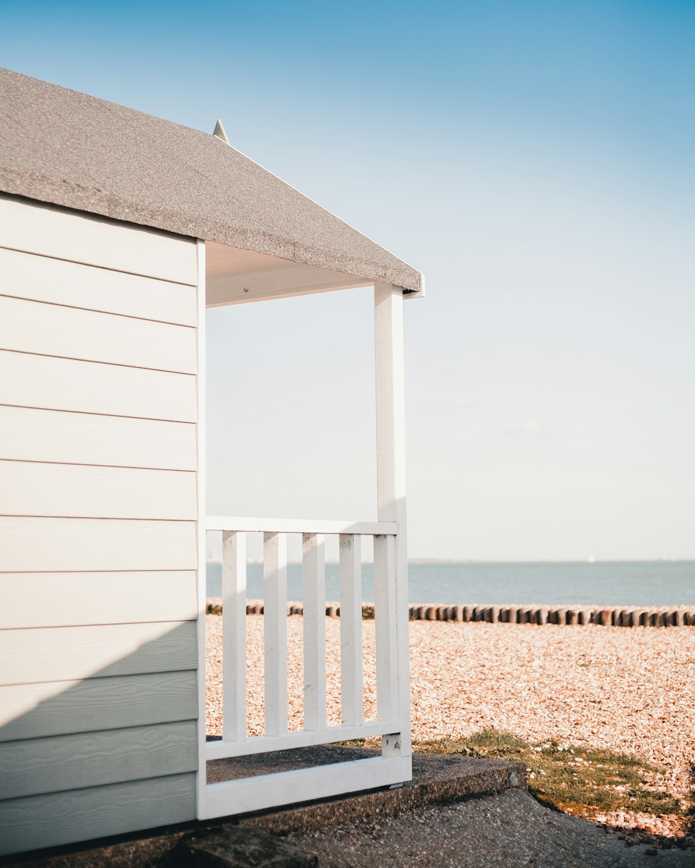 white wooden house at daytime