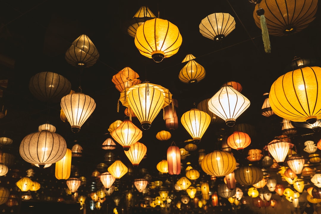 yellow sky lanterns at night