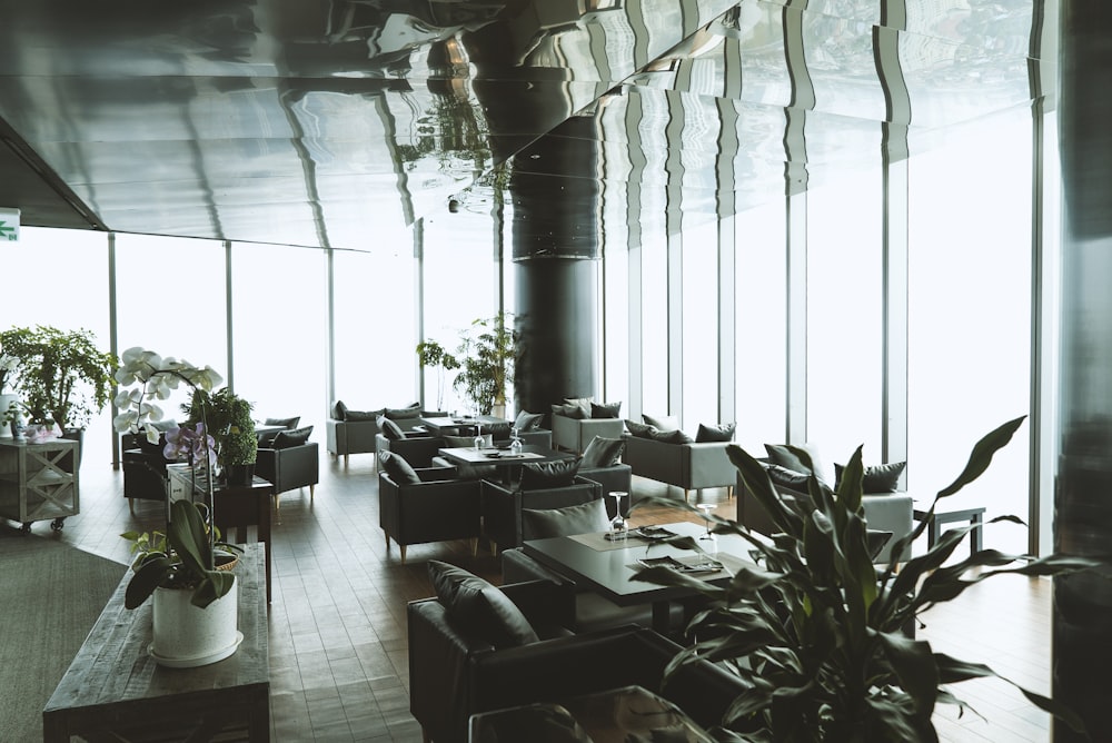 black wooden tables and chairs inside building