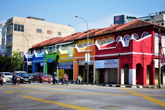 cars in front of building during daytime
