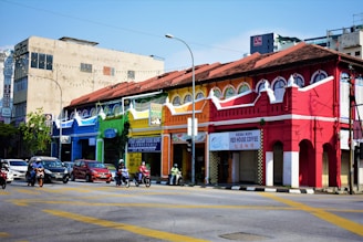 cars in front of building during daytime
