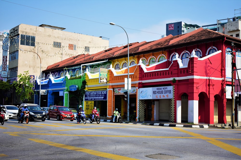 cars in front of building during daytime