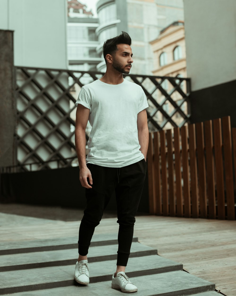 man wearing white crew-neck t-shirt