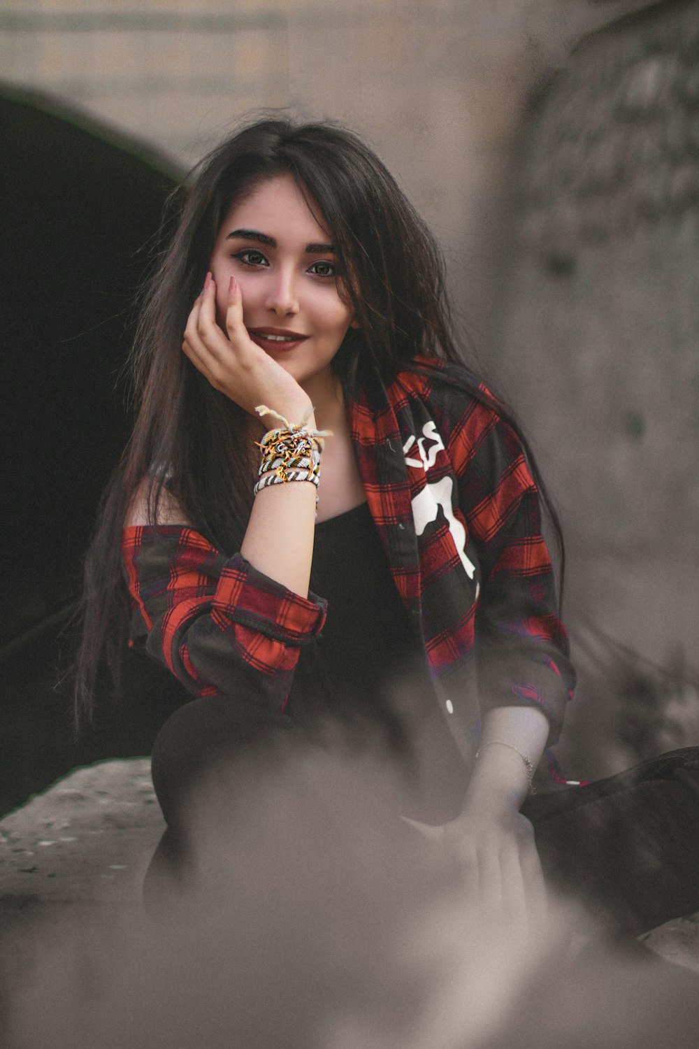 woman wearing black and red dress shirt