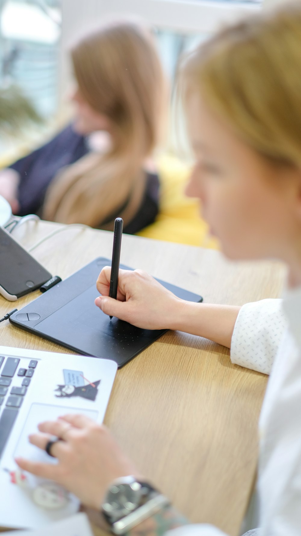 person using Macbook