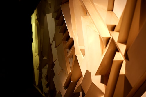 Laser-cut MDF and acrylic shapes arranged artistically.
