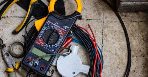 black and yellow clamp meter