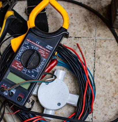 black and yellow clamp meter