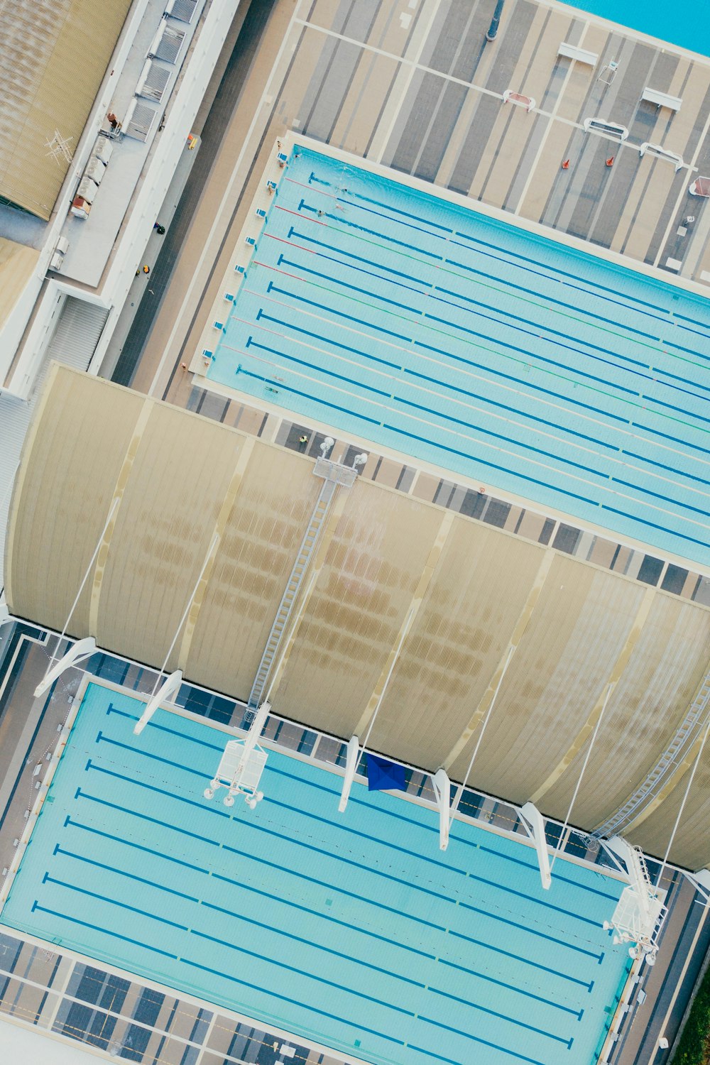 aerial view of two rectangular swimming pools